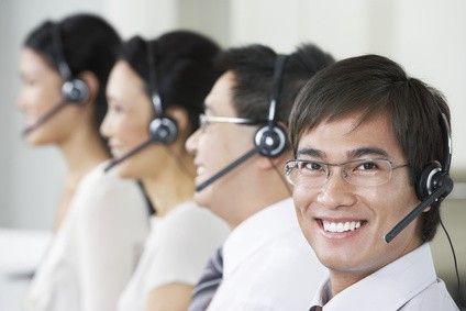 happy team of telemarketers that just closed a lead
